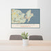 24x36 Gloucester Massachusetts Map Print Lanscape Orientation in Woodblock Style Behind 2 Chairs Table and Potted Plant