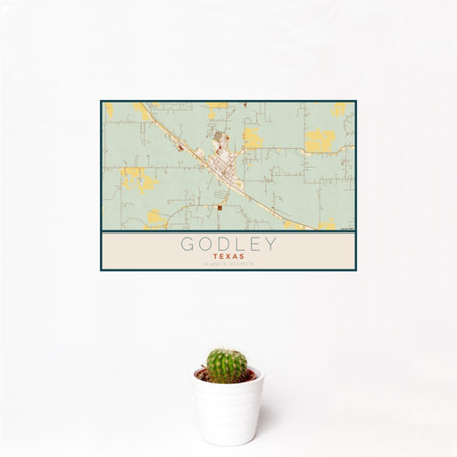 12x18 Godley Texas Map Print Landscape Orientation in Woodblock Style With Small Cactus Plant in White Planter