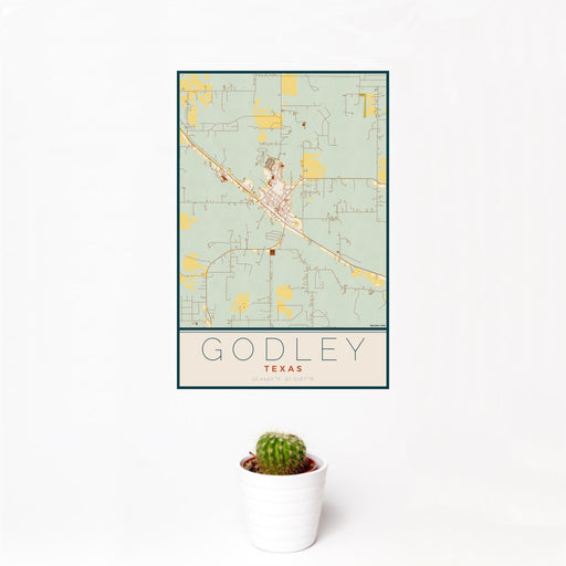 12x18 Godley Texas Map Print Portrait Orientation in Woodblock Style With Small Cactus Plant in White Planter