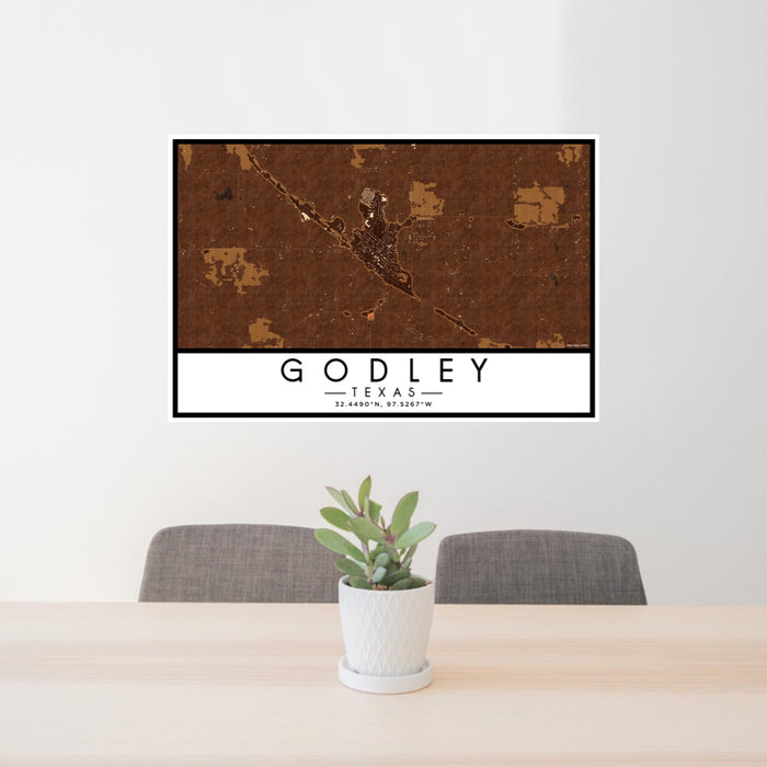 24x36 Godley Texas Map Print Lanscape Orientation in Ember Style Behind 2 Chairs Table and Potted Plant