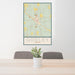 24x36 Godley Texas Map Print Portrait Orientation in Woodblock Style Behind 2 Chairs Table and Potted Plant
