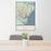 24x36 Golden Isles Georgia Map Print Portrait Orientation in Woodblock Style Behind 2 Chairs Table and Potted Plant