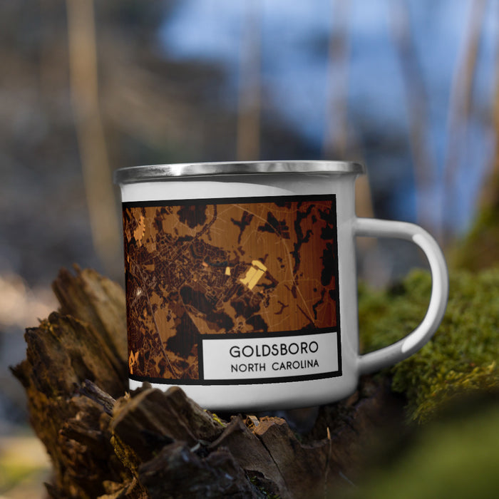 Right View Custom Goldsboro North Carolina Map Enamel Mug in Ember on Grass With Trees in Background