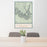 24x36 Grand Canyon National Park Map Print Portrait Orientation in Woodblock Style Behind 2 Chairs Table and Potted Plant