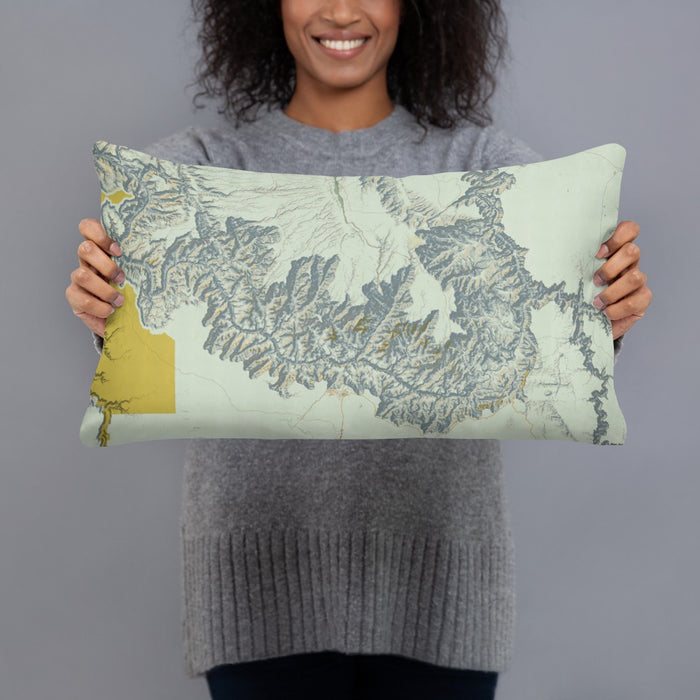 Person holding 20x12 Custom Grand Canyon National Park Map Throw Pillow in Woodblock