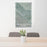 24x36 Grand Junction Colorado Map Print Portrait Orientation in Afternoon Style Behind 2 Chairs Table and Potted Plant