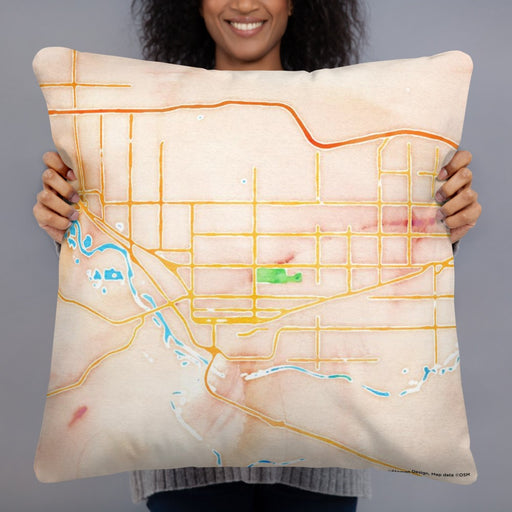 Person holding 22x22 Custom Grand Junction Colorado Map Throw Pillow in Watercolor