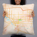 Person holding 22x22 Custom Grand Junction Colorado Map Throw Pillow in Watercolor