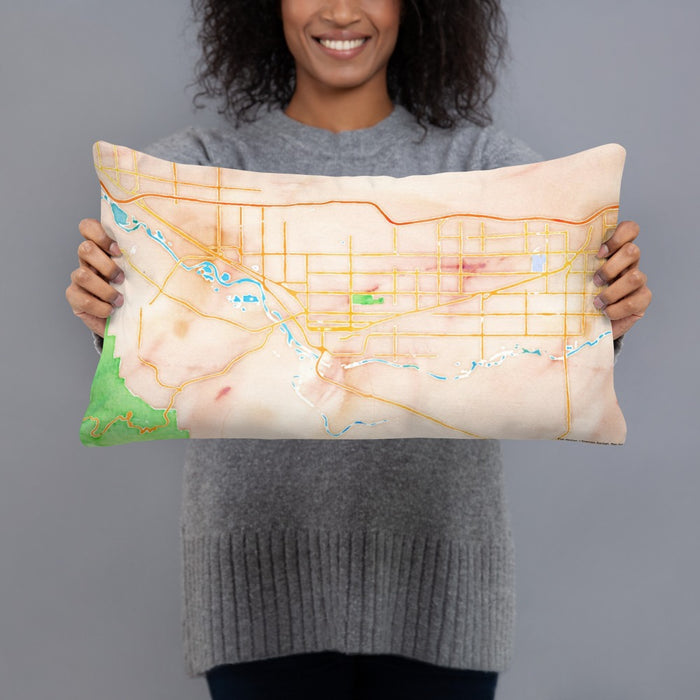 Person holding 20x12 Custom Grand Junction Colorado Map Throw Pillow in Watercolor