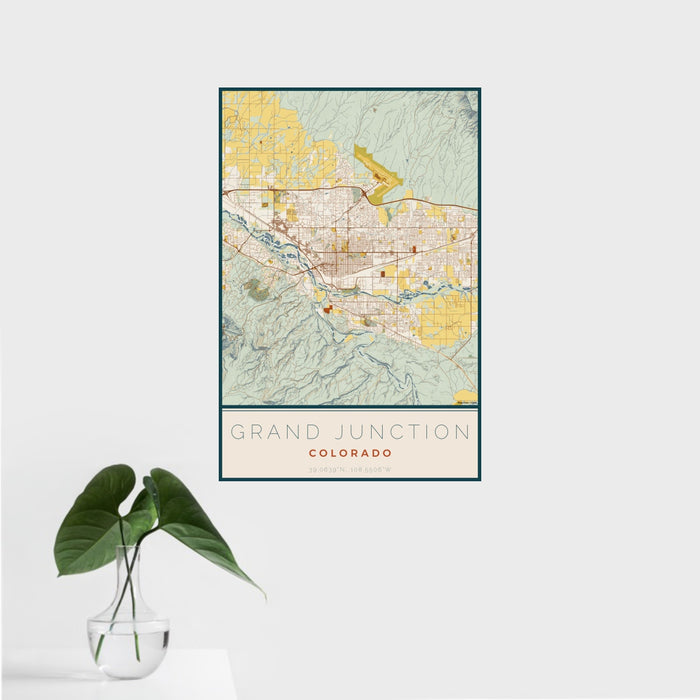 16x24 Grand Junction Colorado Map Print Portrait Orientation in Woodblock Style With Tropical Plant Leaves in Water