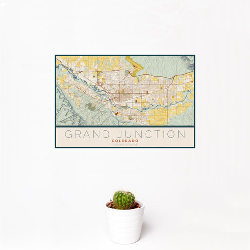 12x18 Grand Junction Colorado Map Print Landscape Orientation in Woodblock Style With Small Cactus Plant in White Planter