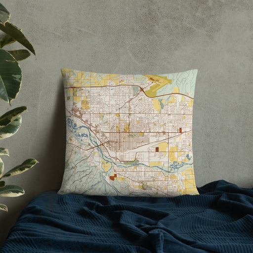 Custom Grand Junction Colorado Map Throw Pillow in Woodblock on Bedding Against Wall
