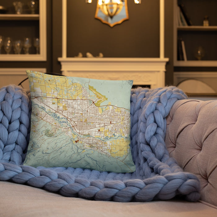 Custom Grand Junction Colorado Map Throw Pillow in Woodblock on Cream Colored Couch