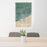 24x36 Grand Marais Minnesota Map Print Portrait Orientation in Afternoon Style Behind 2 Chairs Table and Potted Plant