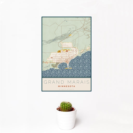 12x18 Grand Marais Minnesota Map Print Portrait Orientation in Woodblock Style With Small Cactus Plant in White Planter
