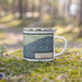 Right View Custom Grand Marais Minnesota Map Enamel Mug in Woodblock on Grass With Trees in Background