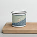 Front View Custom Grand Marais Minnesota Map Enamel Mug in Woodblock on Cutting Board