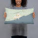 Person holding 20x12 Custom Grand Marais Minnesota Map Throw Pillow in Woodblock