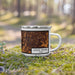Right View Custom Grand Prairie Texas Map Enamel Mug in Ember on Grass With Trees in Background