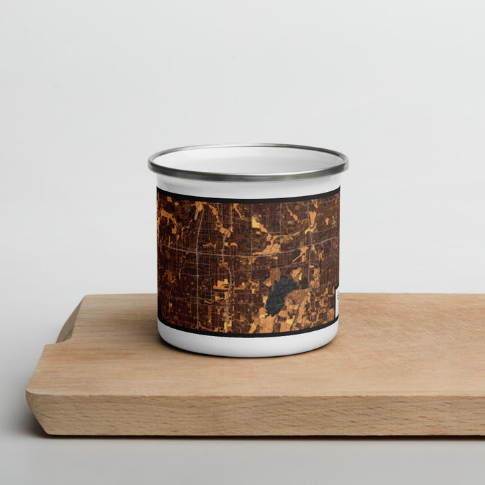 Front View Custom Grand Prairie Texas Map Enamel Mug in Ember on Cutting Board