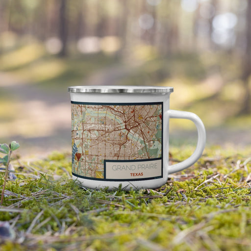 Right View Custom Grand Prairie Texas Map Enamel Mug in Woodblock on Grass With Trees in Background