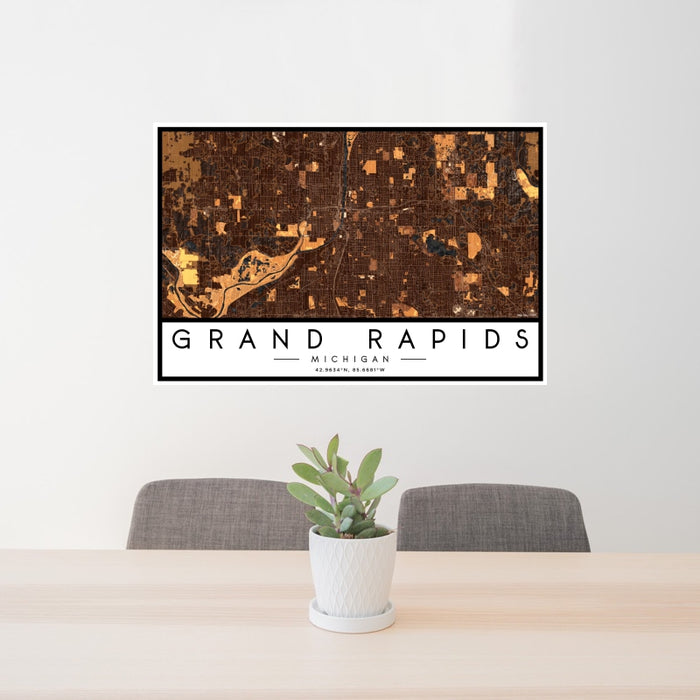 24x36 Grand Rapids Michigan Map Print Landscape Orientation in Ember Style Behind 2 Chairs Table and Potted Plant