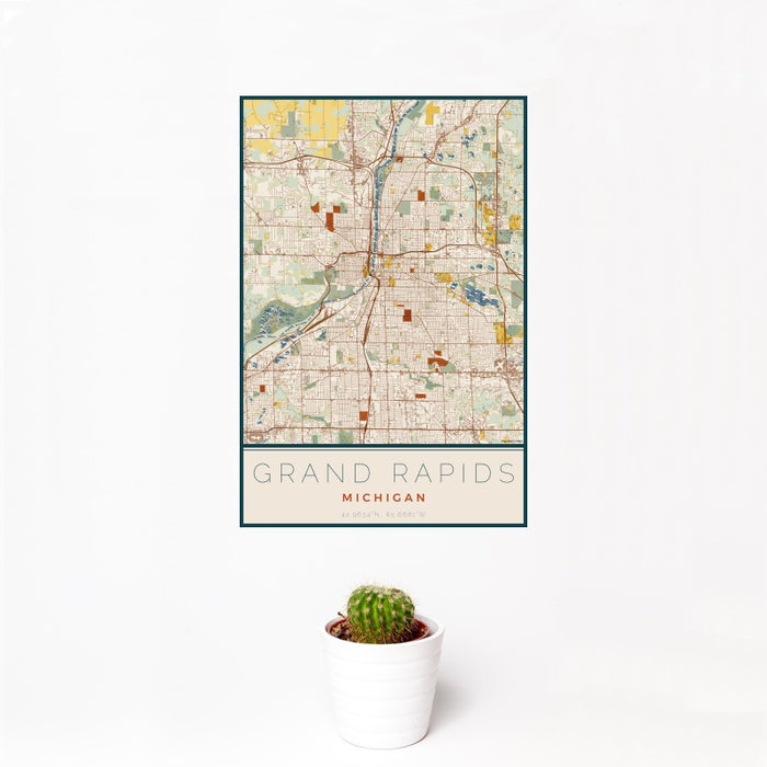 12x18 Grand Rapids Michigan Map Print Portrait Orientation in Woodblock Style With Small Cactus Plant in White Planter