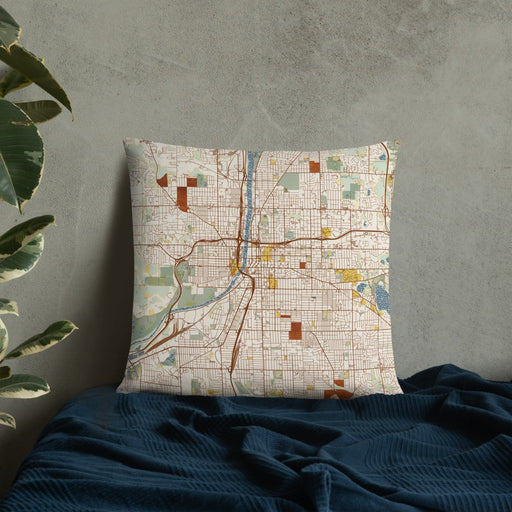 Custom Grand Rapids Michigan Map Throw Pillow in Woodblock on Bedding Against Wall