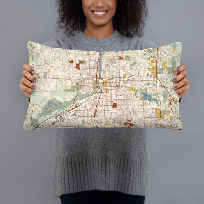 Person holding 20x12 Custom Grand Rapids Michigan Map Throw Pillow in Woodblock