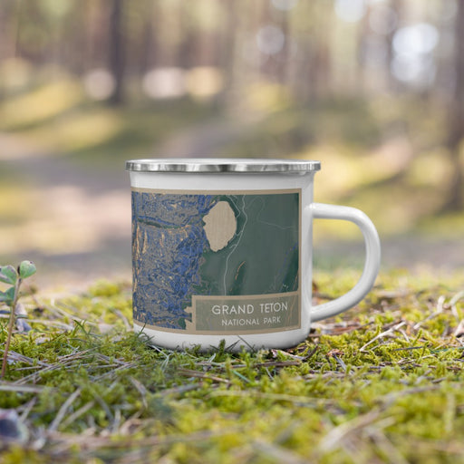 Right View Custom Grand Teton National Park Map Enamel Mug in Afternoon on Grass With Trees in Background