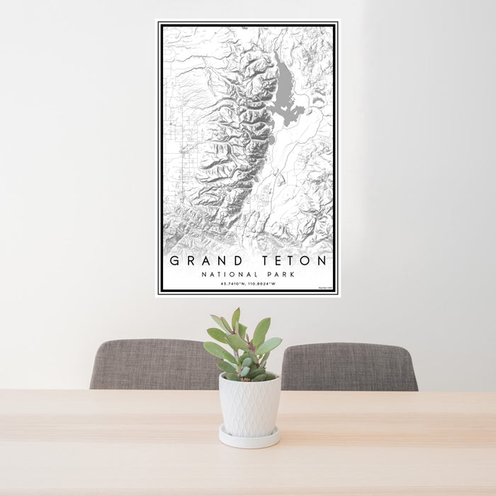 24x36 Grand Teton National Park Map Print Portrait Orientation in Classic Style Behind 2 Chairs Table and Potted Plant