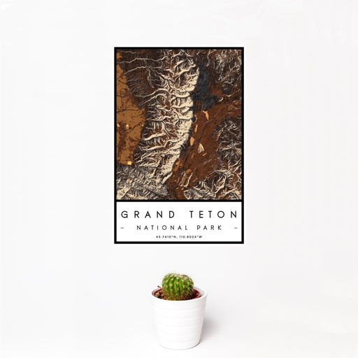 12x18 Grand Teton National Park Map Print Portrait Orientation in Ember Style With Small Cactus Plant in White Planter