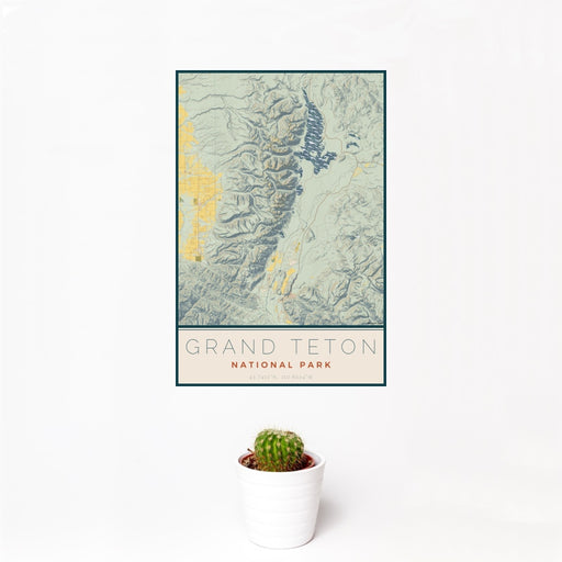 12x18 Grand Teton National Park Map Print Portrait Orientation in Woodblock Style With Small Cactus Plant in White Planter