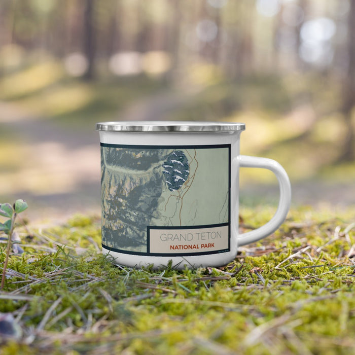 Right View Custom Grand Teton National Park Map Enamel Mug in Woodblock on Grass With Trees in Background