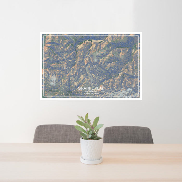 24x36 Granite Peak Montana Map Print Lanscape Orientation in Afternoon Style Behind 2 Chairs Table and Potted Plant