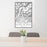 24x36 Granite Peak Montana Map Print Portrait Orientation in Classic Style Behind 2 Chairs Table and Potted Plant
