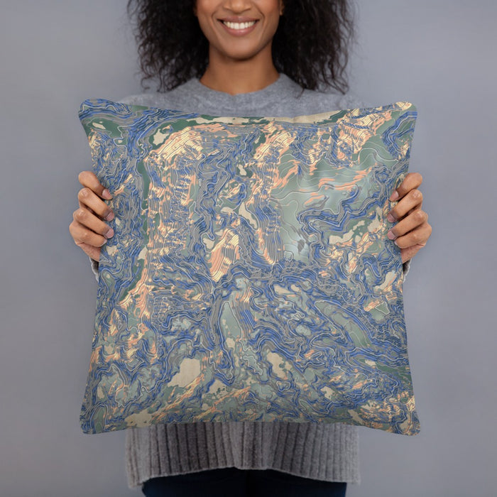 Person holding 18x18 Custom Granite Peak Montana Map Throw Pillow in Afternoon