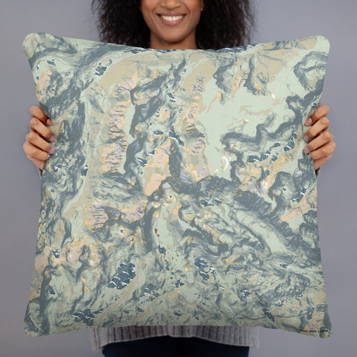 Person holding 22x22 Custom Granite Peak Montana Map Throw Pillow in Woodblock