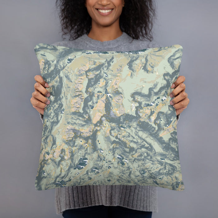 Person holding 18x18 Custom Granite Peak Montana Map Throw Pillow in Woodblock