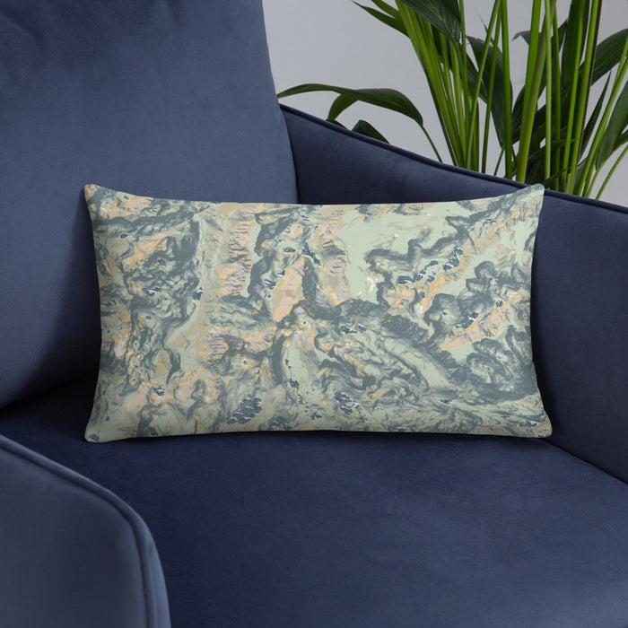 Custom Granite Peak Montana Map Throw Pillow in Woodblock on Blue Colored Chair