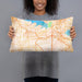 Person holding 20x12 Custom Grapevine Texas Map Throw Pillow in Watercolor
