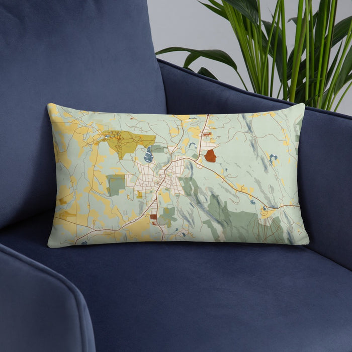 Custom Great Barrington Massachusetts Map Throw Pillow in Woodblock on Blue Colored Chair