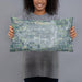 Person holding 20x12 Custom Greeley Colorado Map Throw Pillow in Afternoon