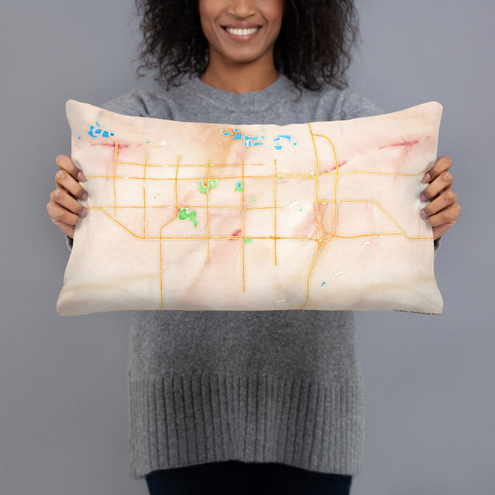 Person holding 20x12 Custom Greeley Colorado Map Throw Pillow in Watercolor