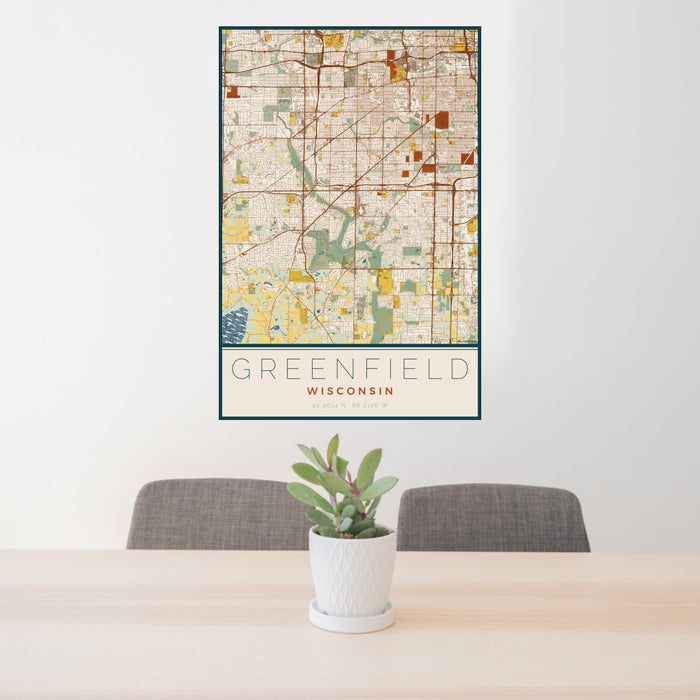 24x36 Greenfield Wisconsin Map Print Portrait Orientation in Woodblock Style Behind 2 Chairs Table and Potted Plant
