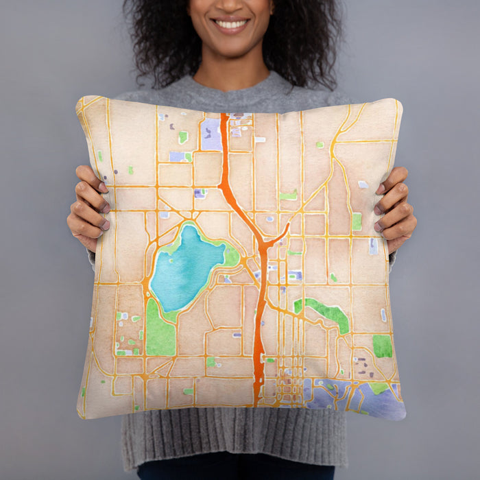 Person holding 18x18 Custom Green Lake Seattle Map Throw Pillow in Watercolor