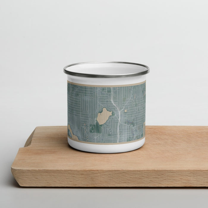Front View Custom Green Lake Washington Map Enamel Mug in Afternoon on Cutting Board