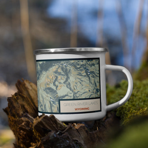 Right View Custom Green River Lakes Wyoming Map Enamel Mug in Woodblock on Grass With Trees in Background