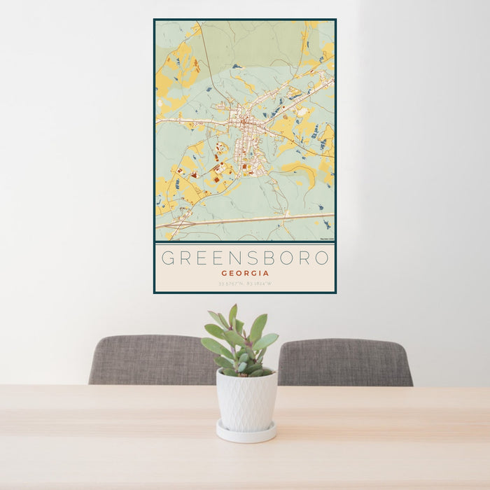 24x36 Greensboro Georgia Map Print Portrait Orientation in Woodblock Style Behind 2 Chairs Table and Potted Plant