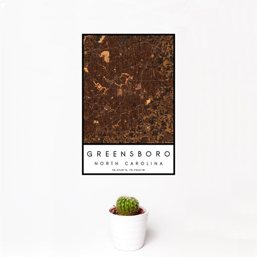12x18 Greensboro North Carolina Map Print Portrait Orientation in Ember Style With Small Cactus Plant in White Planter